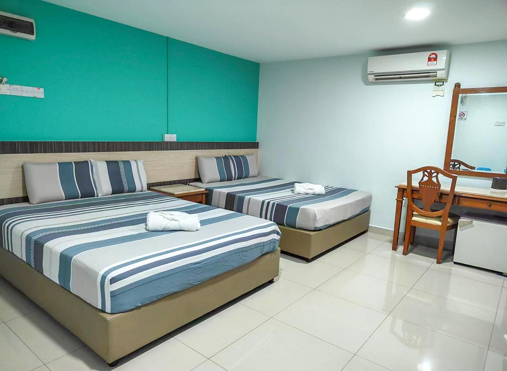 G Star Hotel Pantai Remis Bagian luar foto