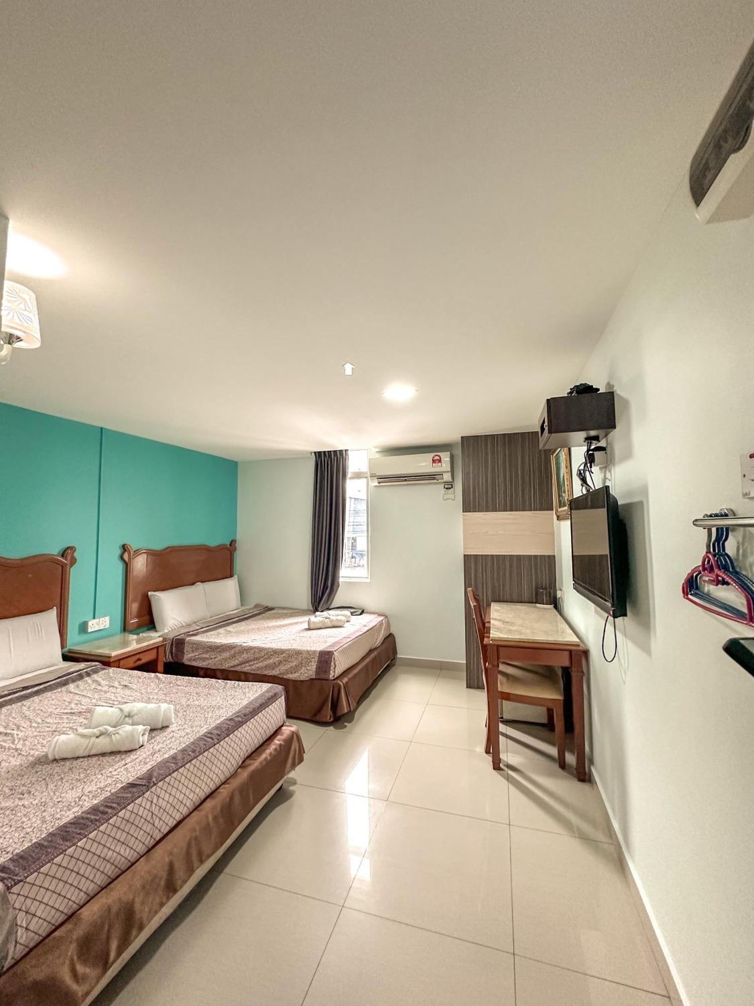 G Star Hotel Pantai Remis Bagian luar foto